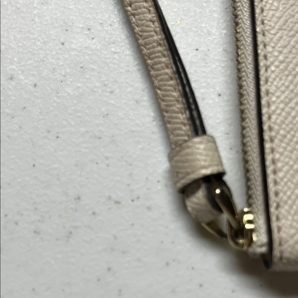 Coach Small Ivory Textured Leather Wristlet